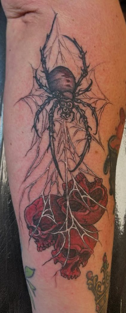 Illustrative spider and rose skull tattoo by Eagle Tattooing West Milford NJ
